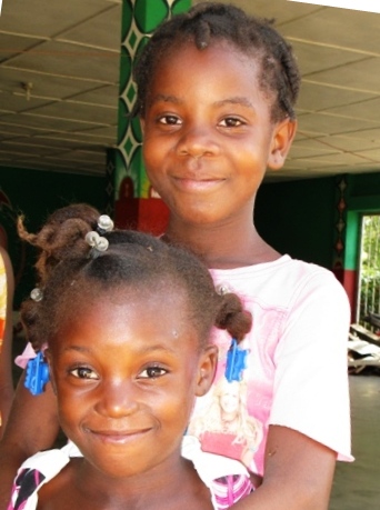 Photo of two smiling Haitian girls